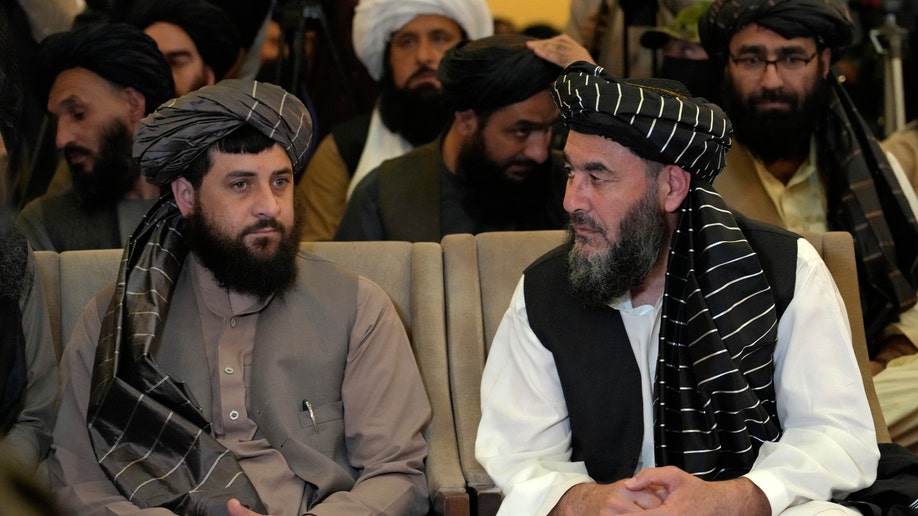 Bashir Noorzai, right, a senior Taliban detainee held in an American prison