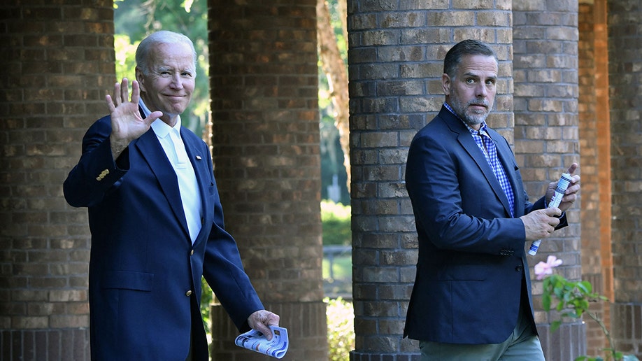 Joe Biden waving near Hunter Biden