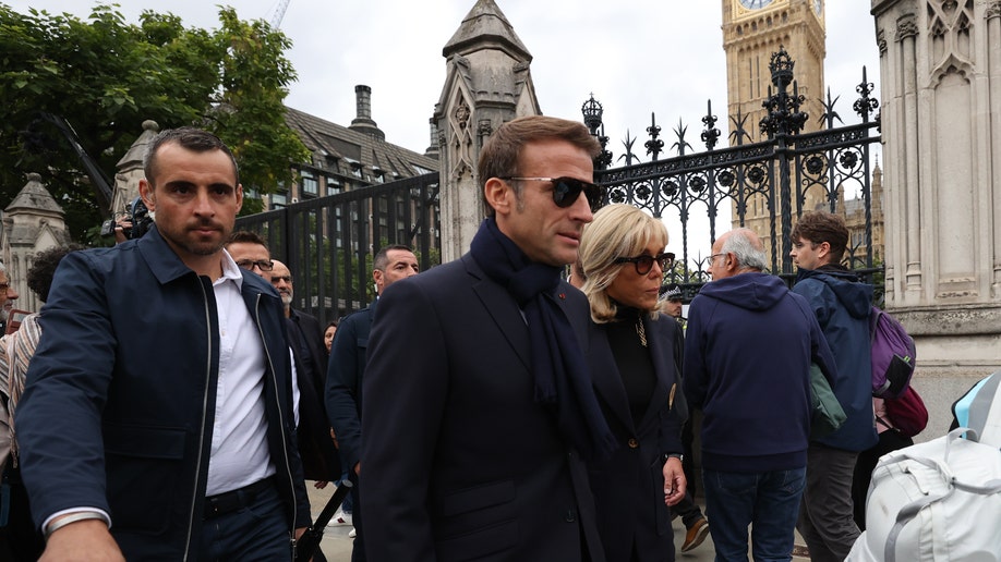 French President Emmanuel Macron and wife prepare to visit the Queen