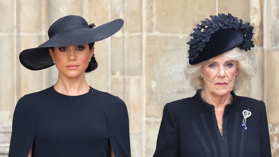 Meghan, Duchess of Sussex and Camilla, Queen Consort