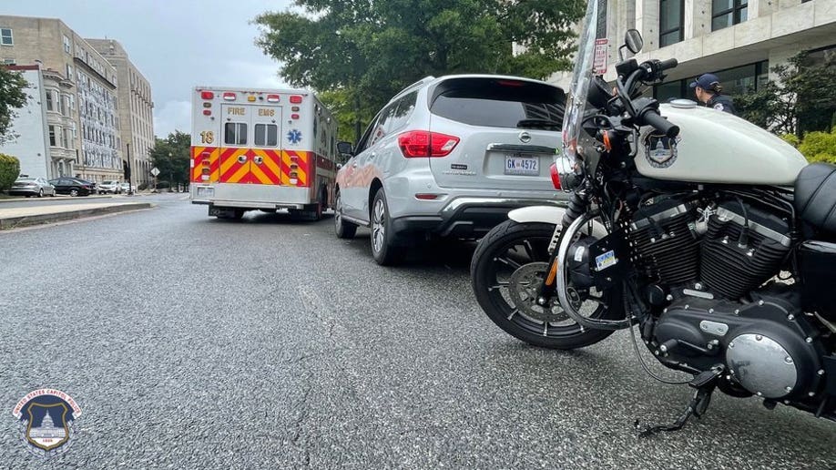 A U.S. Capitol Police Motorcycle and District of Columbia Ambulance