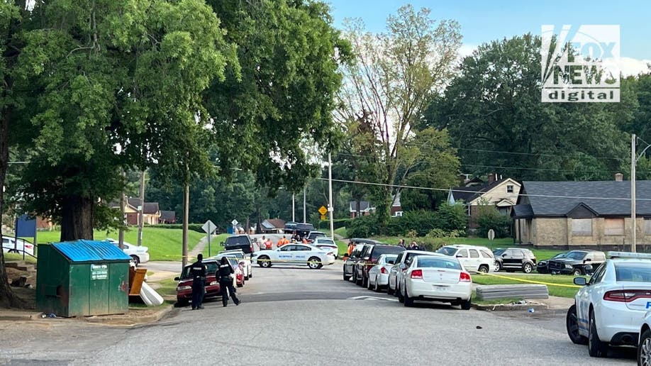 Police at a crime scene in the Liz Fletcher kidnaping