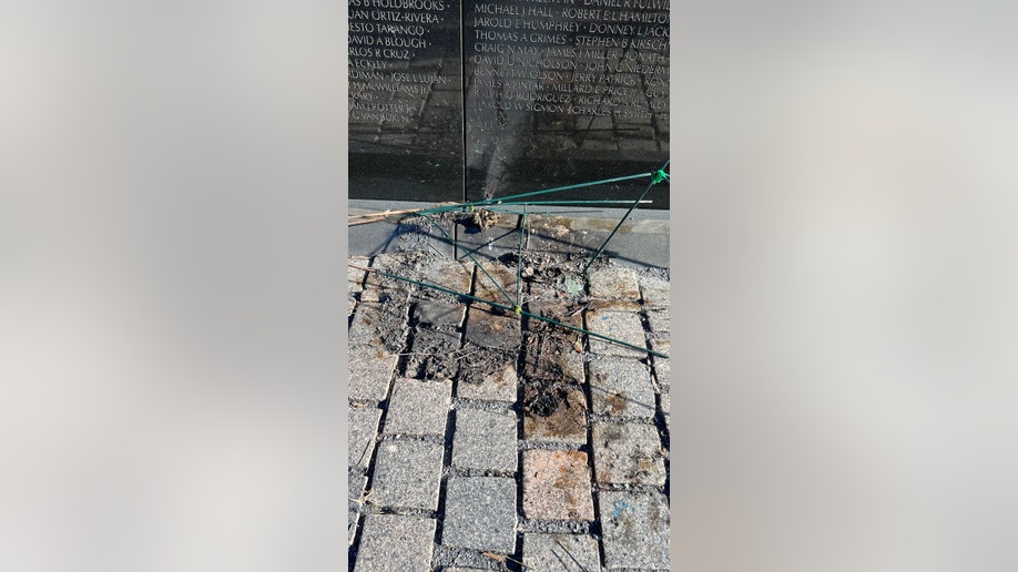 The vandalized memorial