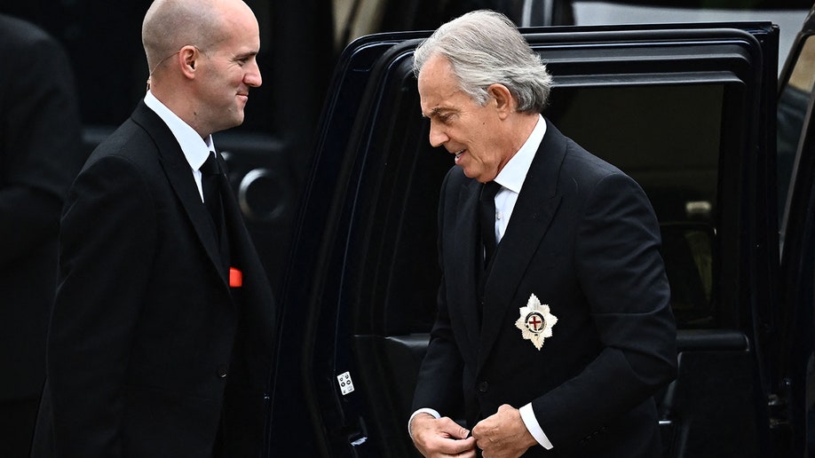 Former British PM Tony Blair wears a suit and tie for Queen Elizabeth's state funeral