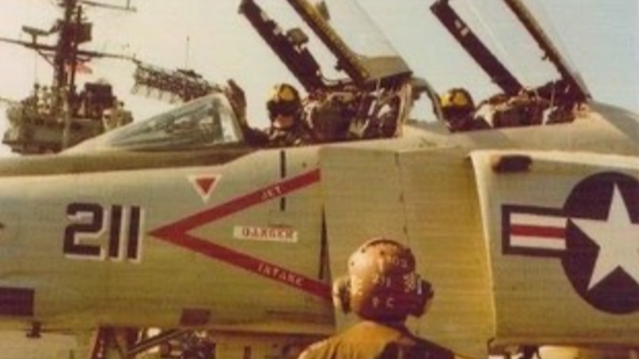 Photo shows fighter pilot Charles "Chic" Burlingame in a fighter jet for the Navy