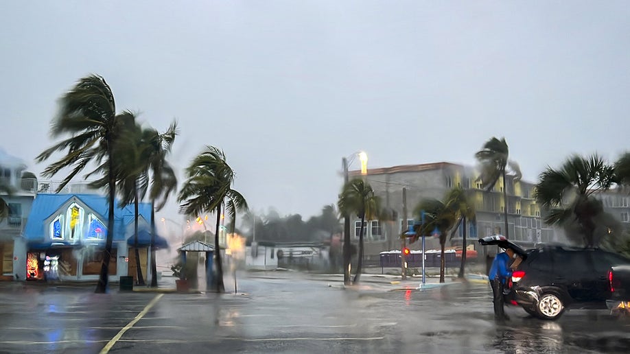 Flooding takes over a parking lot in Myers Beach, Florida during Hurricane Ian