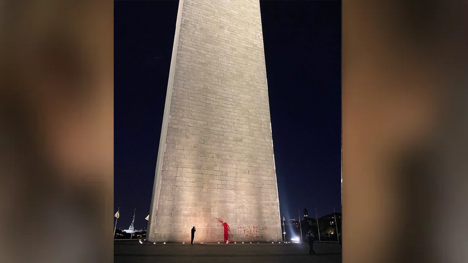 Washington monument splashed with red paint