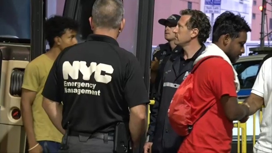NYC employees greeting migrants