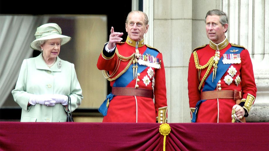 Prince Philip, Prince Charles and Queen Elizabeth on the Balcony of Buckingham Palace