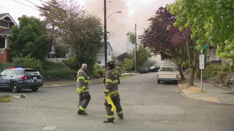 Seattle responders coordinate near house fire
