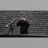 A police officer looks at St Giles' Cathedral, in Edinburgh