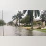 Residential streets in Naples, Florida flood during Hurricane Ian