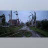Trees and debris lay strewn across a Punta Gorda street as Hurricane Ian devastates Florida