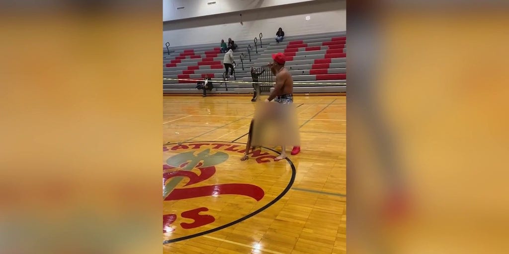 ExNFL-player-brings-underdressed-dancer-