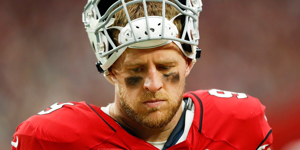 Las Vegas Raiders quarterback Derek Carr (4) is sacked by Arizona Cardinals  defensive end J.J. Watt (99) during the first half of an NFL football game  Sunday, Sept. 18, 2022, in Las