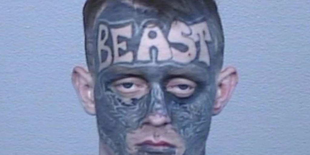 Australian fugitive with full face tattoo, 'Beast' written on forehead arrested after 2 weeks on the run - Vimarsana News