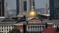 Boston, MA - July 16: A view of the Massachusetts State House, and the Leonard P. Zakim Bunker Hill Memorial Bridge behind it, from a new condo building on Lagrange Street in the Boston Theater District on July 16, 2021.