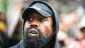 PARIS, FRANCE - OCTOBER 02: Kanye West aka Ye is seen wearing a Balenciaga boxing mouthguard, outside Givenchy, during Paris Fashion Week - Womenswear Spring/Summer 2023 - Day Seven on October 02, 2022 in Paris, France. (Photo by Edward Berthelot/GC Images)