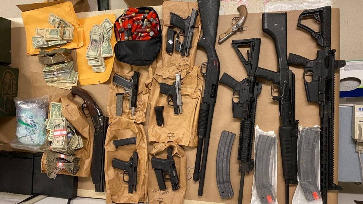 Guns and money seized in Washington and California