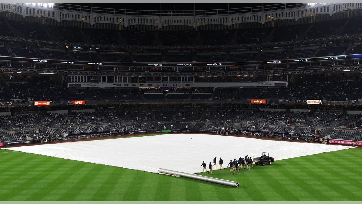 Yankee Stadium with tarp on infield
