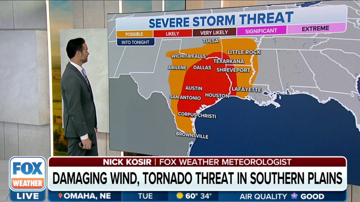 Weather reporter in front of map showing severe weather in Texas