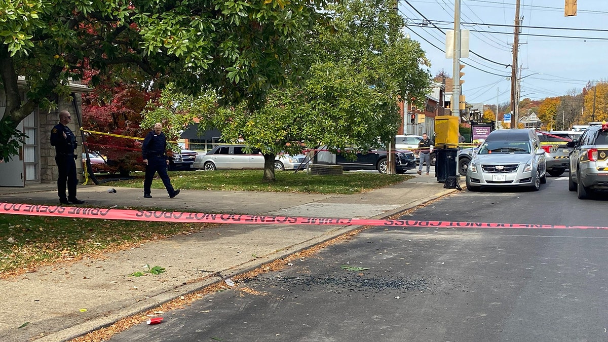 A photo showing caution tape around the crime scene