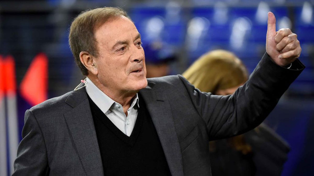 TV broadcaster Al Michaels looks on before a game