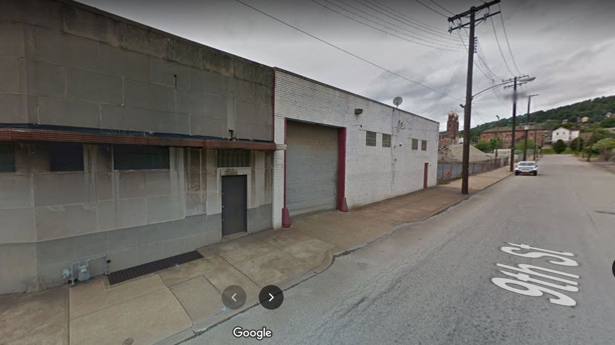 Street view of run down buildings in Braddock