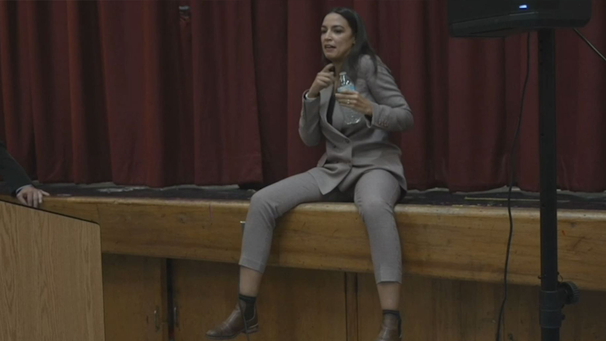 Alexandria-Ocasio Cortez dancing at protesters