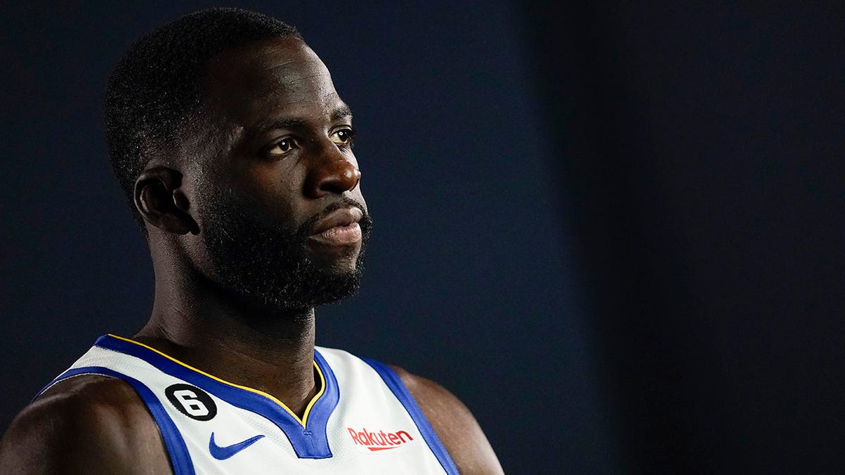 Draymond Green poses for a photo at Warriors media day