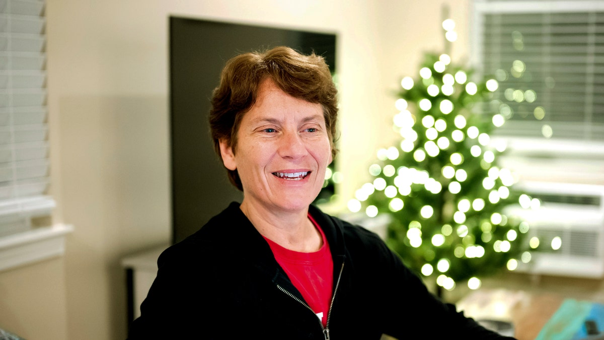 Stanford Professor Carolyn Bertozzi fields congratulatory emails shortly after learning she was awarded the Nobel Prize in chemistry on Wednesday, Oct. 5, 2022, in Palo Alto, Calif.