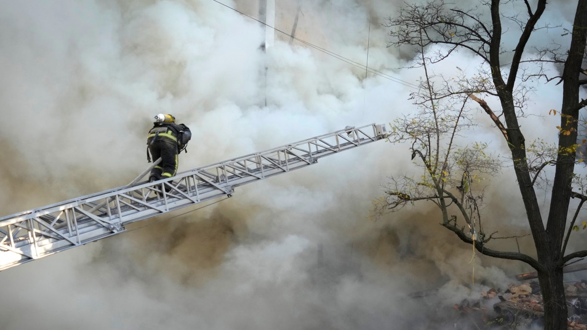 Firefighter near Kyiv damage from drone