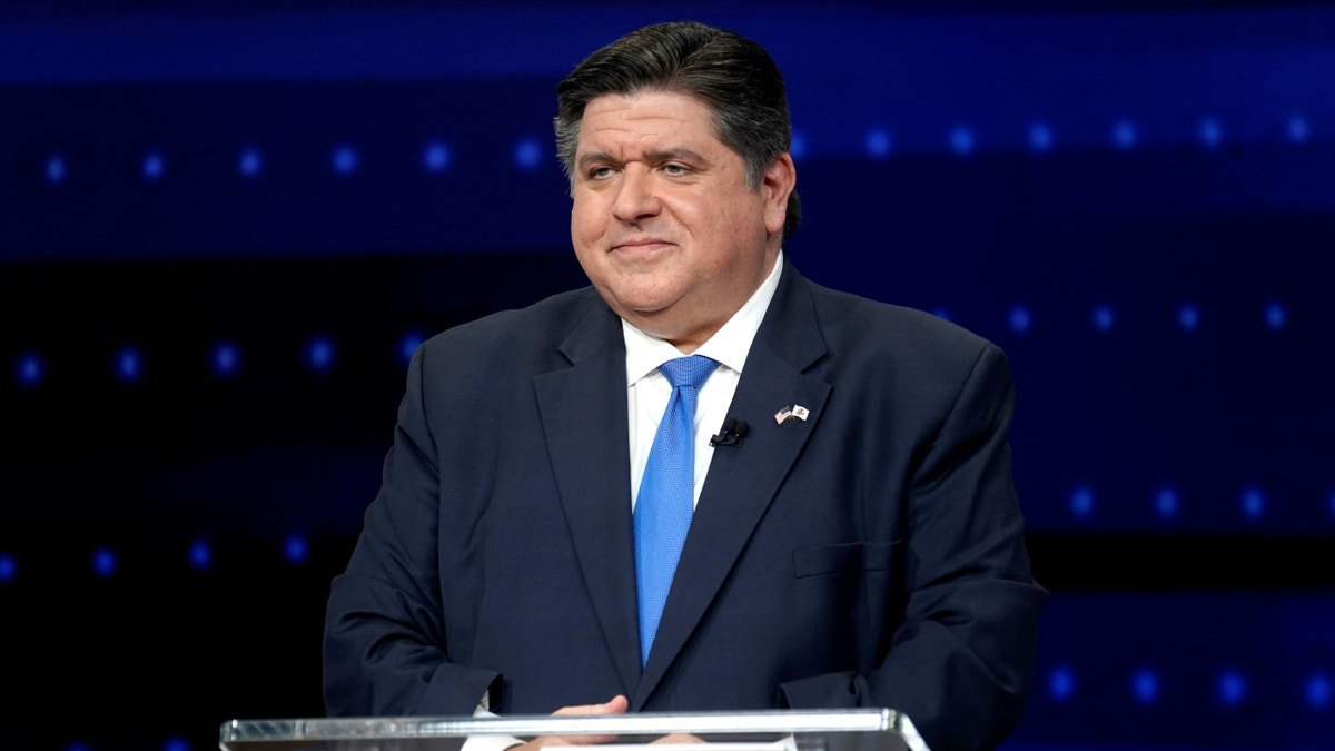 Illinois Gov. J.B. Pritzker at lectern