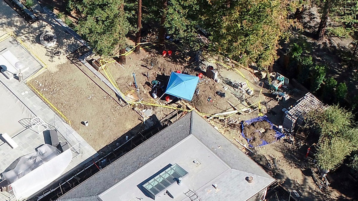 tent shown where car is buried