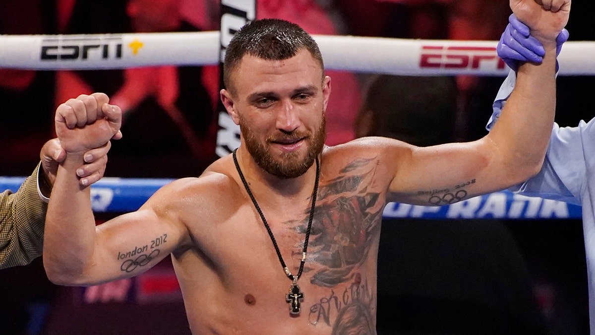 A photo of Vasiliy Lomachenko celebrating