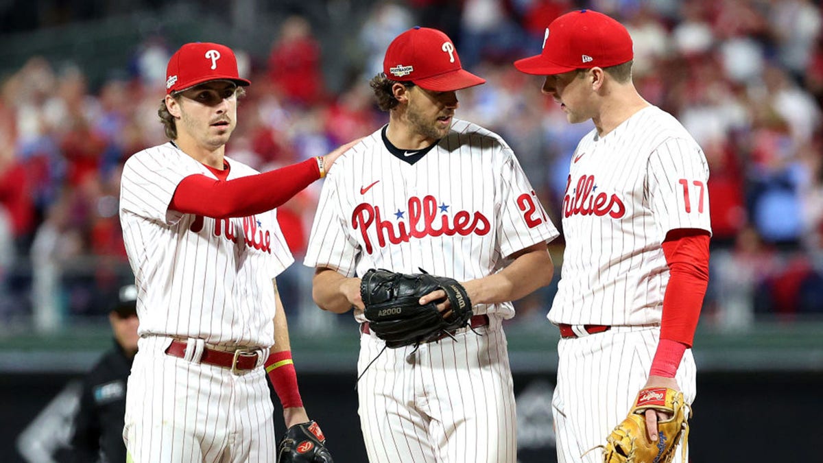 Aaron Nola talks with Bryson Stott