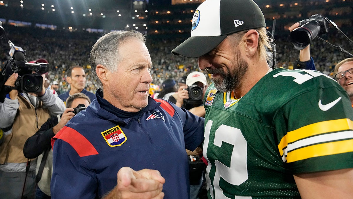 Aaron Rodgers and Bill Belichick
