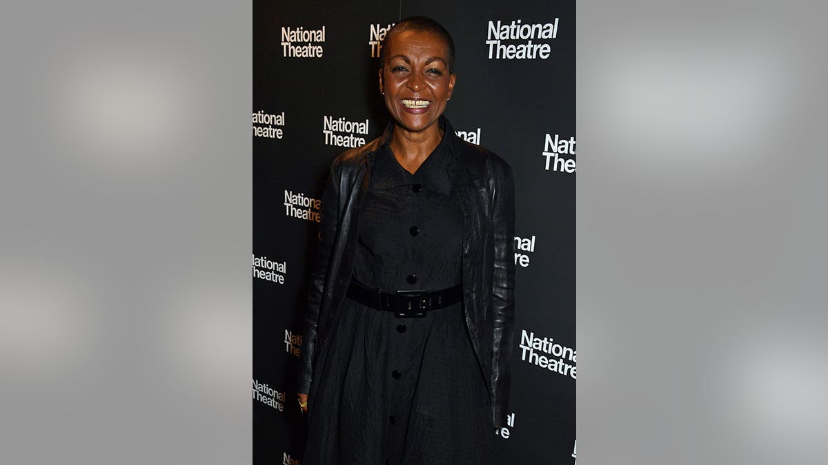 Adjoa Andoh wears all black at event carpet