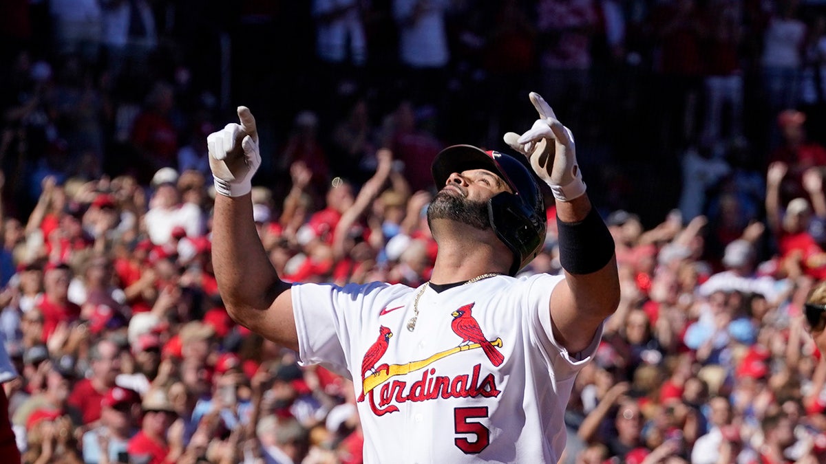 Albert Pujols celebrates a home run