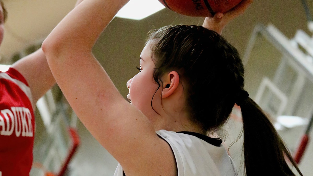 Amelia Ford playing basketball