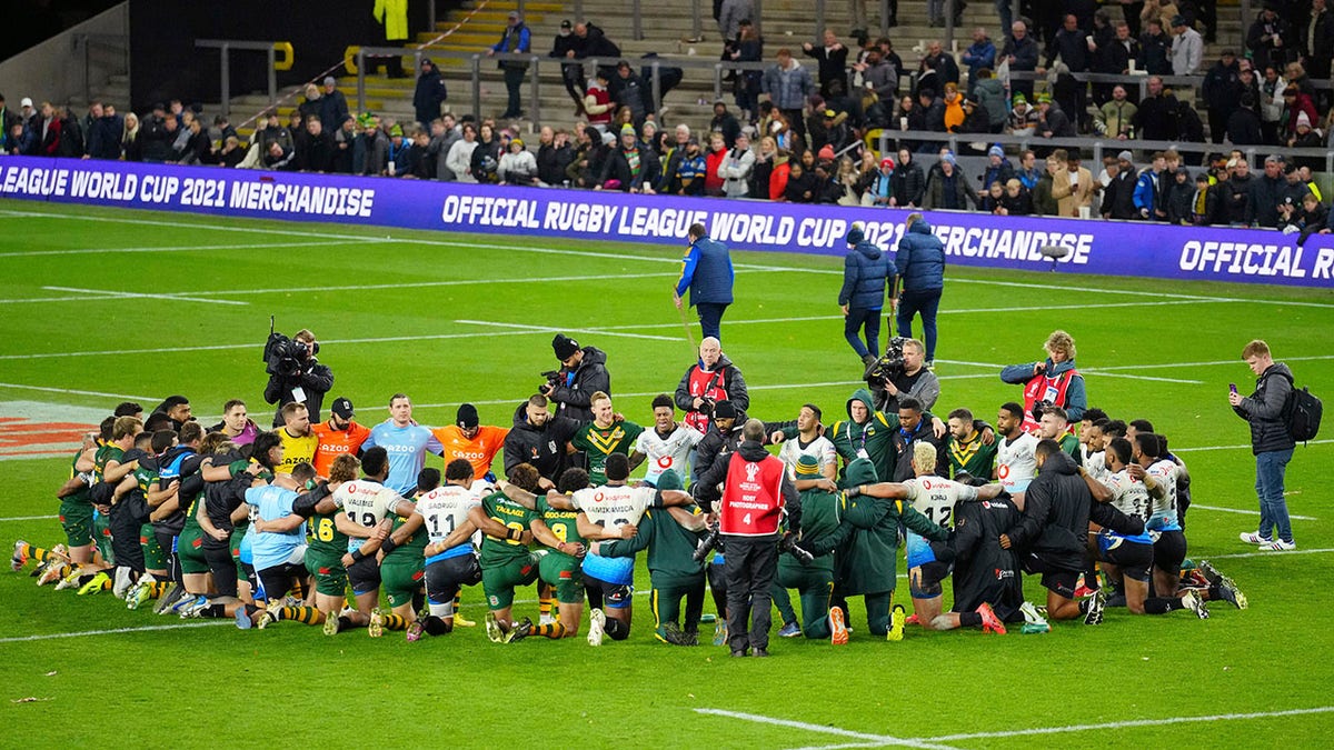 Australia and Rugby players pray