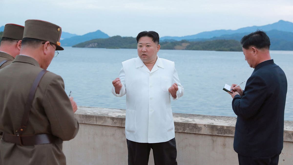 North Korea's leader Kim Jong Un speaks at an undisclosed location in North Korea