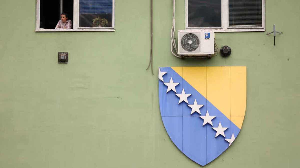 Bosnia flag outside of a building