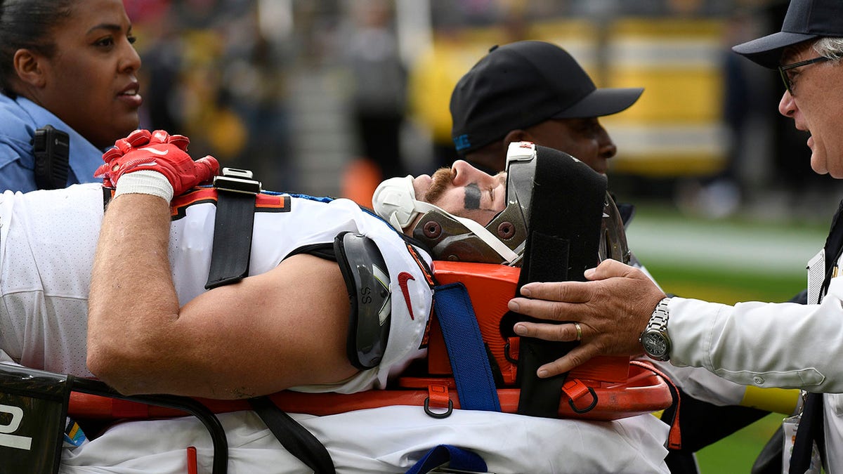 Cameron Brate stretchered off the field