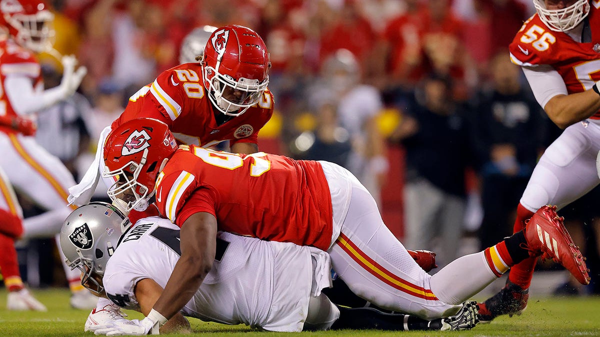 Chris Jones tackles Derek Carr