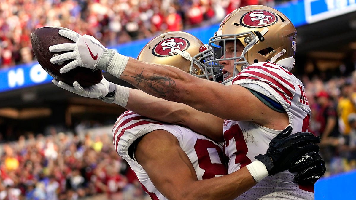 McCaffrey makes history as 49ers win sloppy Thursday Night game