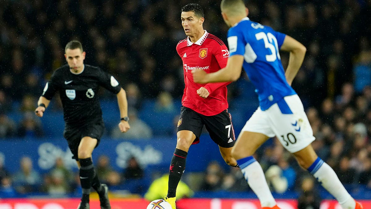 Cristiano Ronaldo charges down field