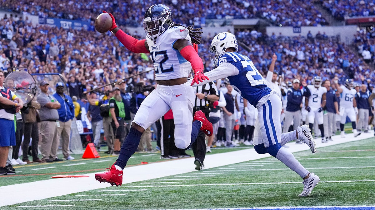 Tennessee Titans running back Derrick Henry (22) runs the ball against the  Indianapolis Colts during an NFL football game in Indianapolis, Sunday,  Dec. 1, 2019. The Titans won the game 31-17. (Jeff