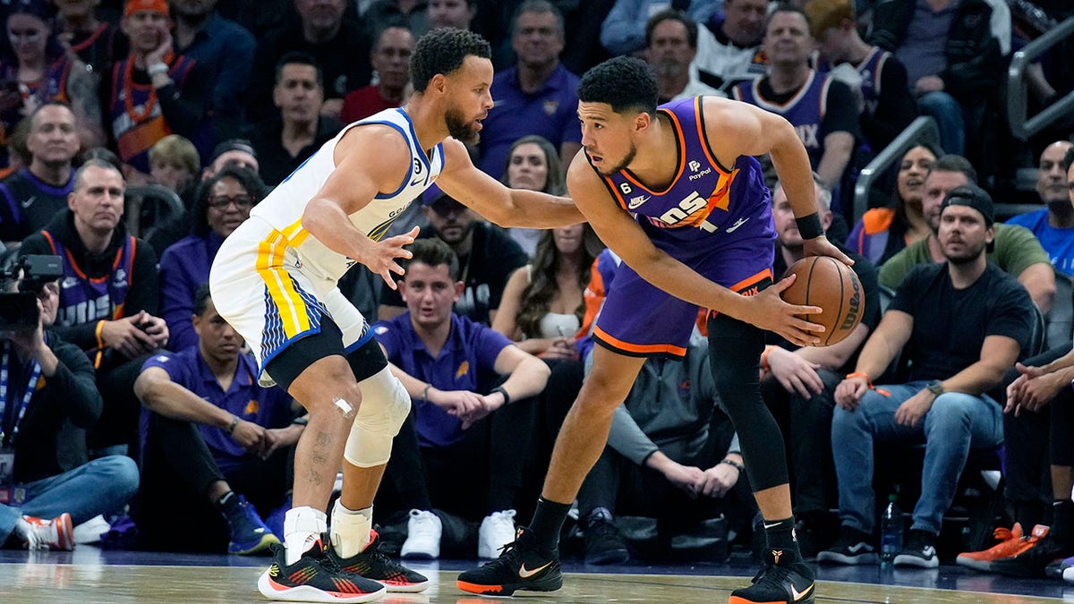 Devin Booker looks to drive
