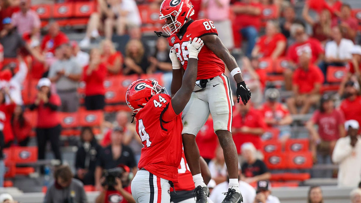 Dillon Bell celebrates with his teammates